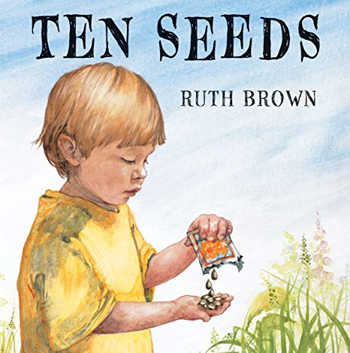 Boy holding seeds