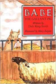 A white sheep with a black head looks up at a piglet who is leaning over a barrier and looking back in a hay-covered barn.